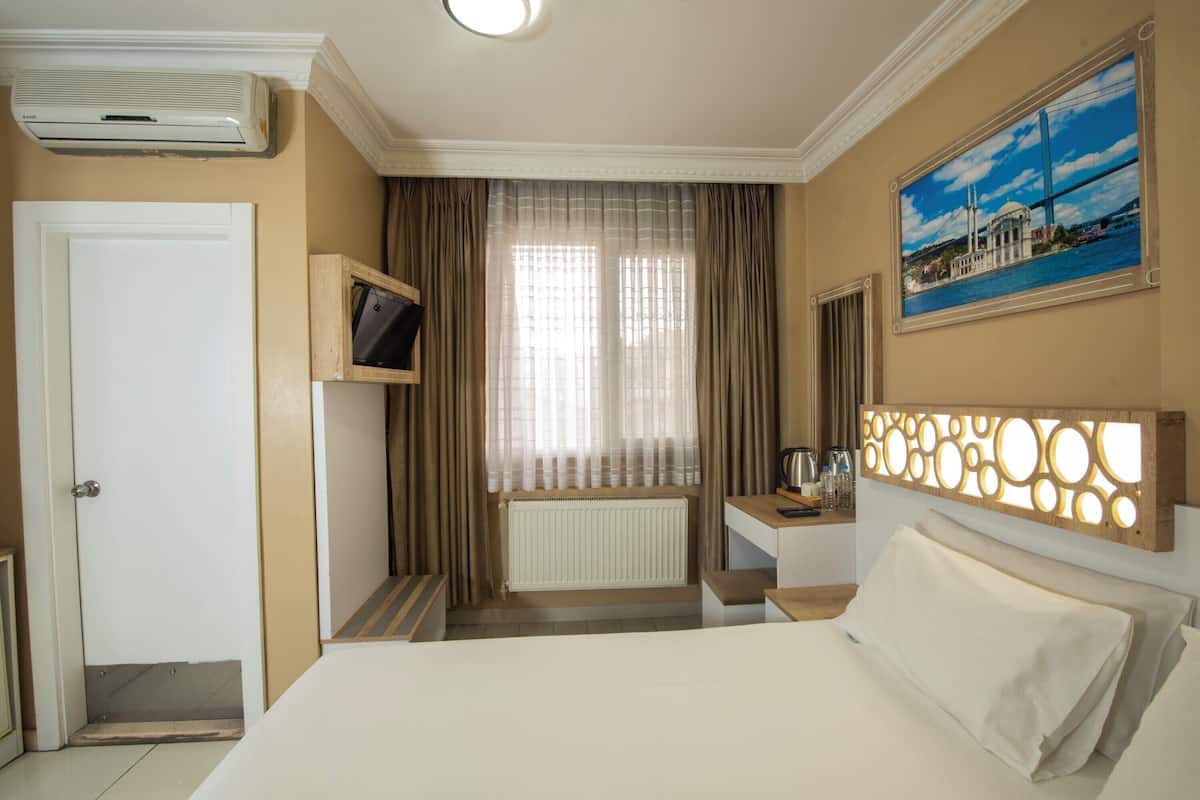 Ropa de cama de alta calidad y minibar