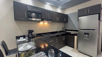 Kamar Quadruple Keluarga, 2 Tempat Tidur Queen | Dapur pribadi | Filter teh/kopi yang dapat dipakai lagi