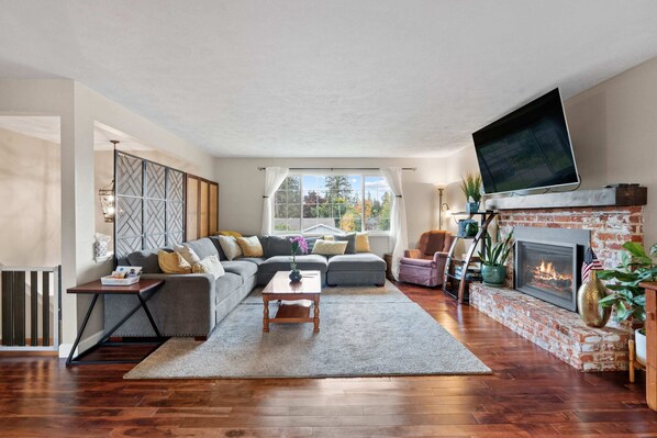 TV, fireplace - The Spot | Chill South Hill Vibes + Pool Table (Spokane)