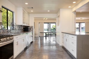 Fridge, microwave, oven, stovetop - Pool, Putting Green | Modern Home on the Golf Course! | Quinta Blue by AvantStay (La Quinta)