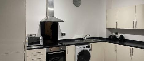 Apartment | Private kitchen | Fridge, microwave, oven, stovetop