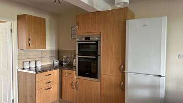 Apartment | Private kitchen | Fridge, microwave, oven, stovetop