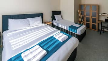 Egyptian cotton sheets, premium bedding, minibar, desk