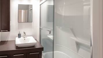 Shower, hair dryer, towels