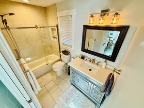 Hair dryer, towels, soap, shampoo