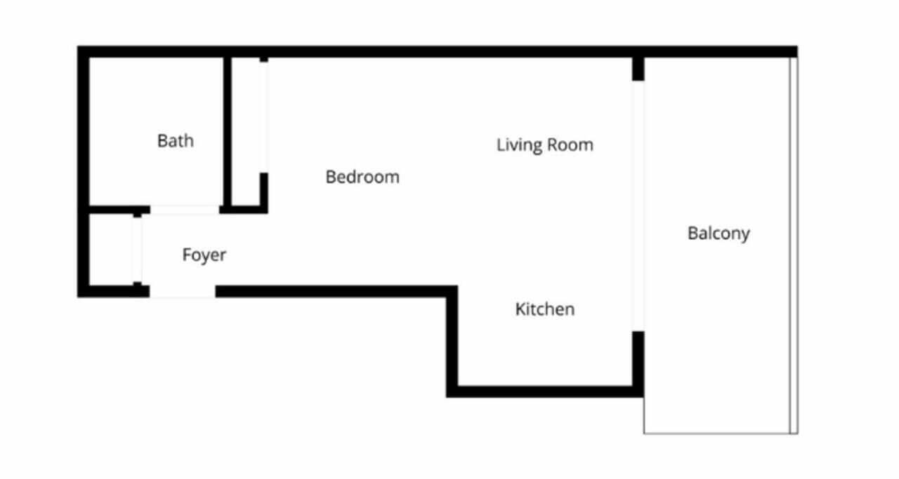 Pianta degli ambienti che mostra una camera da letto, un bagno, un ingresso, un soggiorno, una cucina e un balcone.