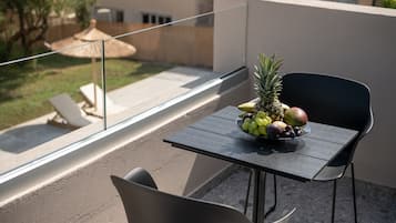 Deluxe Quadruple Room, Multiple Beds | Balcony view