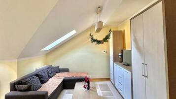 Comfort-Apartment | Wohnbereich | Flachbildfernseher