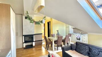 Comfort Apartment | Living area | Flat-screen TV