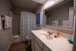 Hair dryer, towels, soap, shampoo