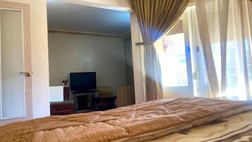 Suite | 1 habitación, minibar, caja de seguridad en la habitación y escritorio