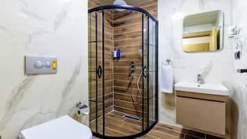Shower, free toiletries, hair dryer, slippers