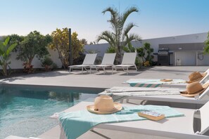 A heated pool - Sunset Sights | Modern ocean-view 4-bedroom villa with heated pool. (Montaña Roja)