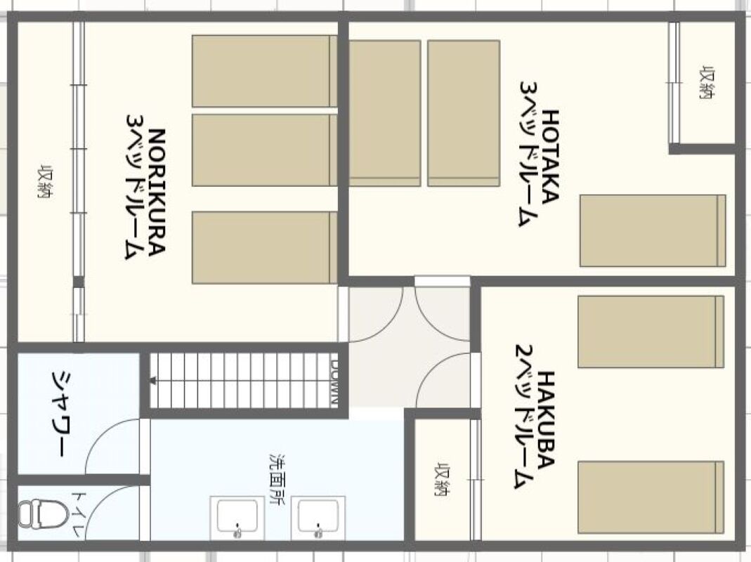 A hotel layout with multiple rooms, a kitchen, and a bathroom.