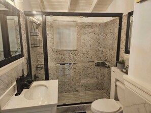 Shower, hair dryer, towels, soap