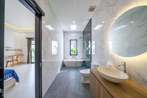 Shower, hair dryer, towels, soap