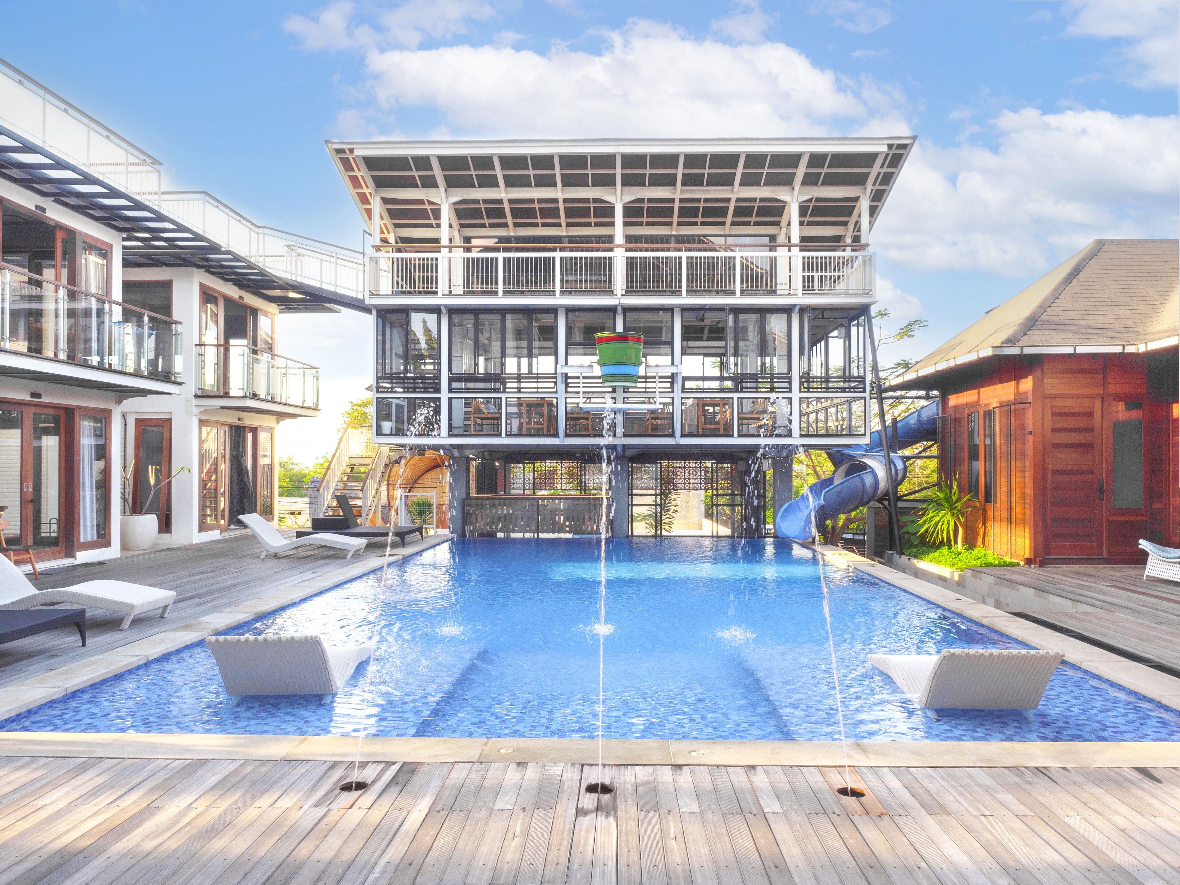 Outdoor pool, open 9:00 AM to 9:00 PM, pool loungers