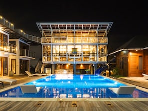 Outdoor pool, open 9:00 AM to 9:00 PM, pool loungers