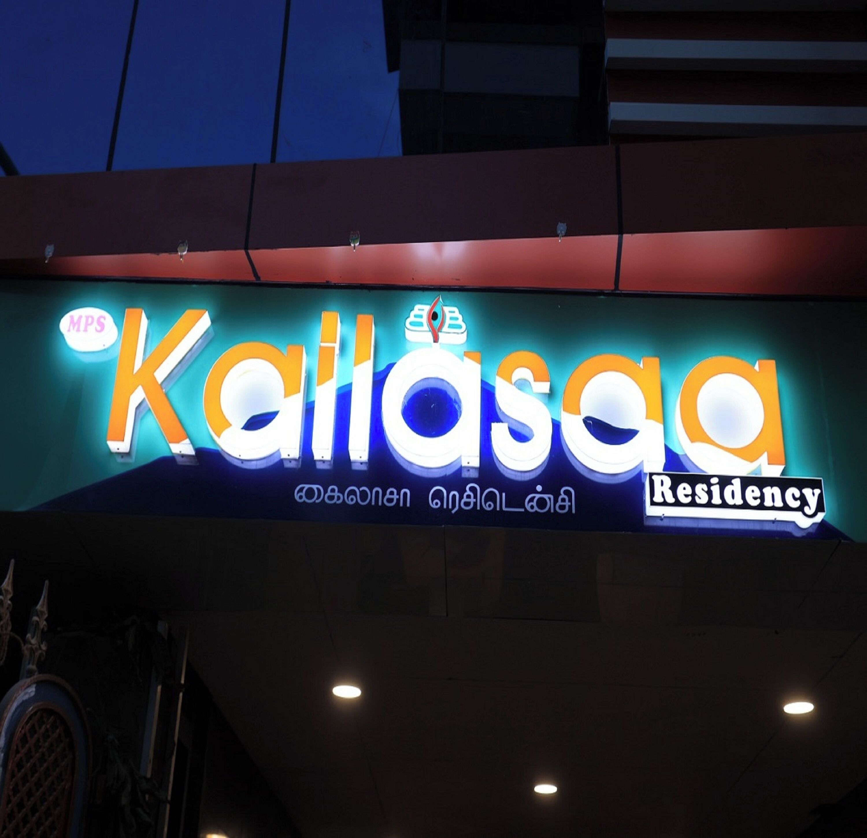A hotel sign with the name 'Kallasa' and 'Residency' indicating a type of accommodation.