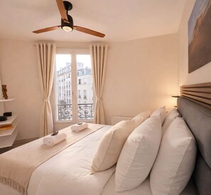 1 غرفة نوم ومكواة/لوح كي وواي فاي وملاءات أسرّة