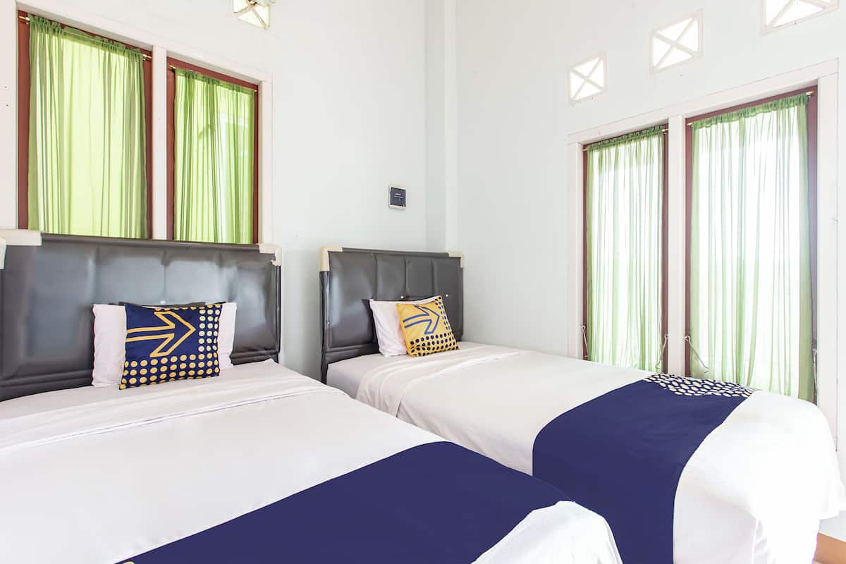 Kamar Double Basic | Wi-Fi gratis dan seprai linen