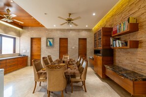 Enjoy meals in this dining area with a large table and six chairs.