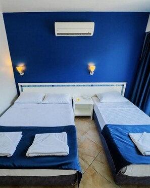 Quarto standard | 1 quarto, frigobar, roupa de cama