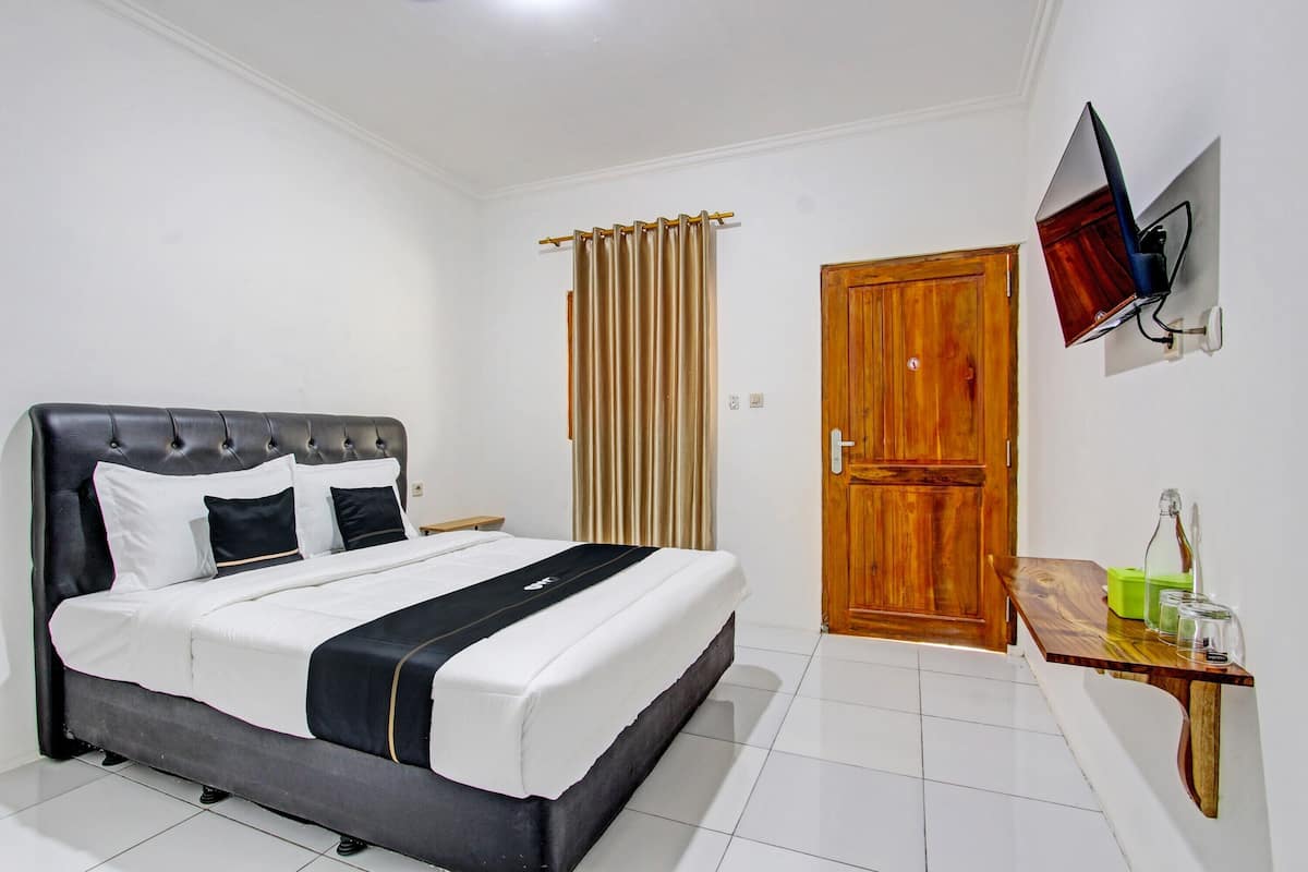 Kamar Double Standar | 1 kamar tidur, ruang kerja ramah laptop, Wi-Fi gratis, dan seprai linen