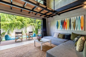 Apartment | Living area | 49-inch Smart TV with digital channels - Berawa Loft by Betterplace (Canggu)