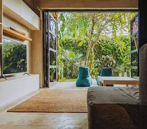 Apartment | Living area | 49-inch Smart TV with digital channels - Berawa Loft by Betterplace (Canggu)