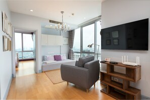 Apartamento, 1 quarto, sacada, vista para o jardim | Sala de estar