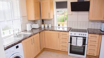 Apartment | Private kitchen | Fridge, microwave, oven, stovetop