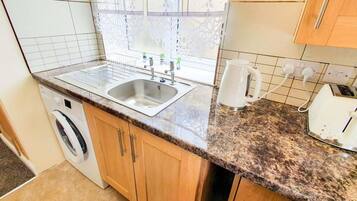 Apartment | Private kitchen | Fridge, microwave, oven, stovetop