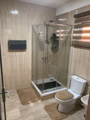 Shower, towels, soap, shampoo
