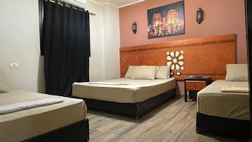 Comfort Triple Room | In-room safe, individually decorated, individually furnished