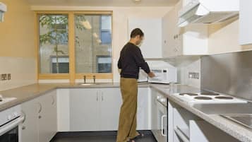 Fridge, microwave, cookware/dishes/utensils, freezer
