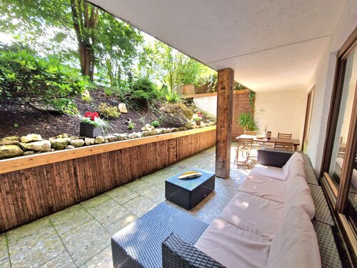 Spacious apartment with large terrace & direct access to cross-country ski trails, hiking & MTB trails