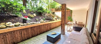 Spacious apartment with large terrace & direct access to cross-country ski trails, hiking & MTB trails