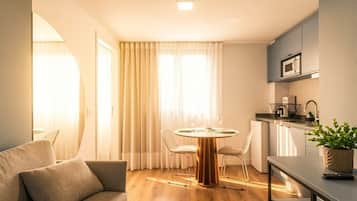 Basic Apartment | Living area | Flat-screen TV