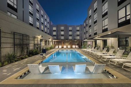 Outdoor pool, free pool cabanas, pool loungers. Home2 Suites by Hilton Austin East Side 5th Street