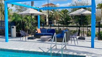 Outdoor pool, open 6:00 AM to 7:00 PM, pool umbrellas, sun loungers