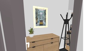 A room with a wooden dresser, a potted plant, a framed picture on the wall, and a black floor lamp. - Appartement Cosy au Pied de La Défense (Courbevoie)