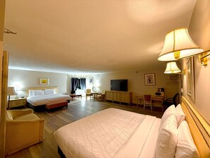 King Suite | Premium bedding, down comforters, pillowtop beds, individually decorated - Presque Isle Hotel (Presque Isle)