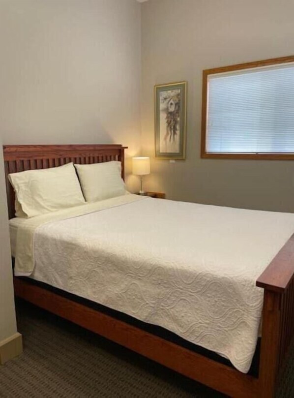 1 bedroom, desk, iron/ironing board, travel crib