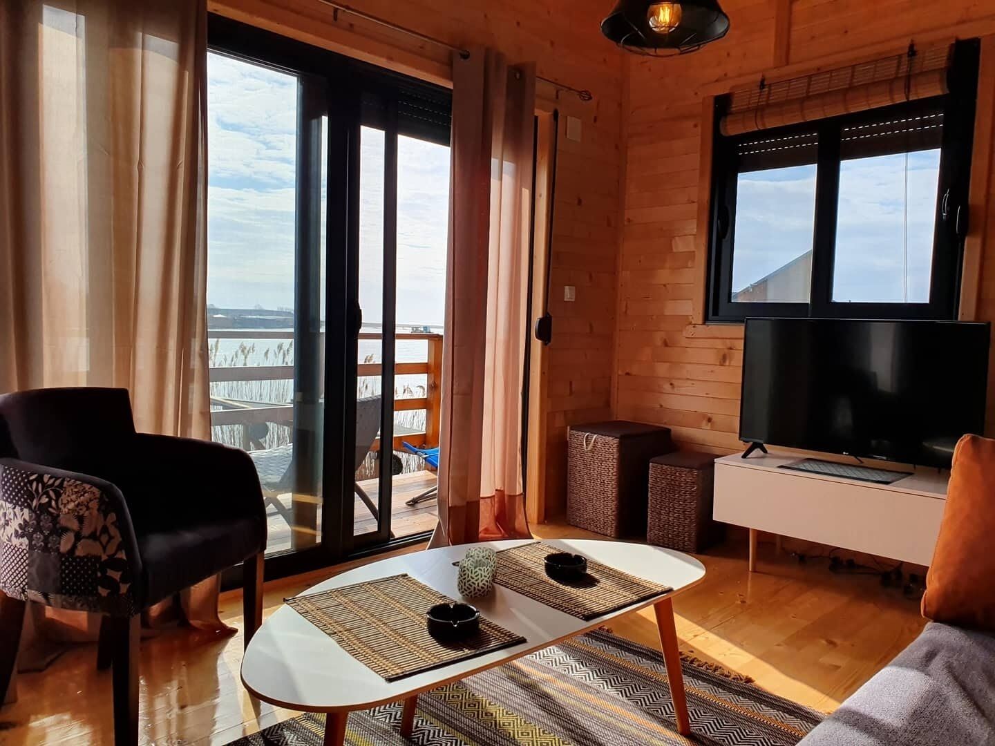 Casa Grand | Área de sala de estar | Televisión de pantalla plana 