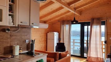 Grand House | Living area | Flat-screen TV