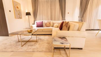 Departamento Confort | Área de sala de estar | Smart TV y servicios de streaming
