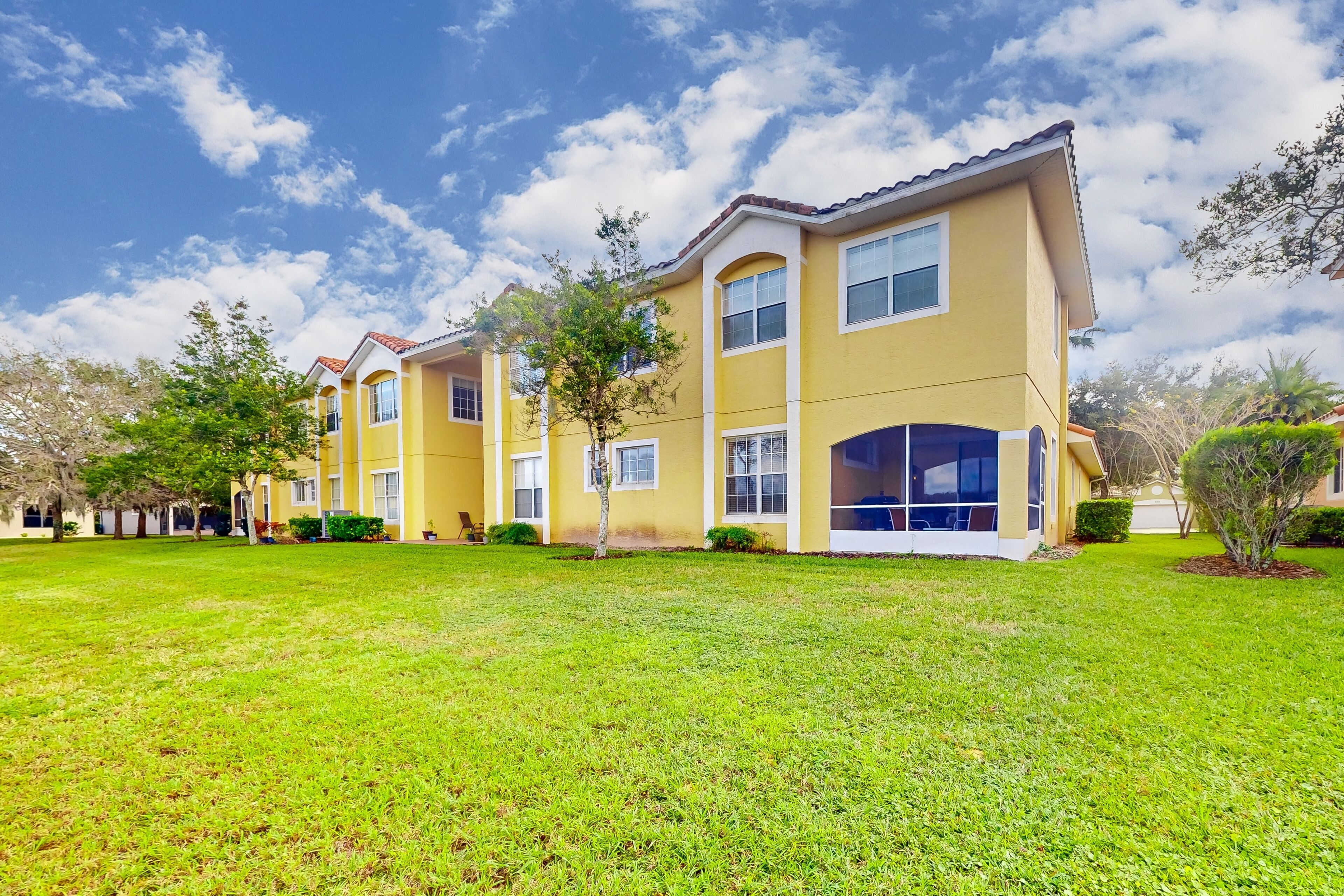 Corner-lot home with water view, on-site golf, enclosed patio, BBQ, & W/D