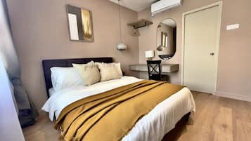 3 habitaciones, tabla de planchar con plancha, wifi y ropa de cama