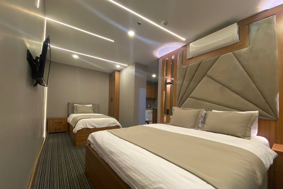 Triple Room | Egyptian cotton sheets, premium bedding, down comforters